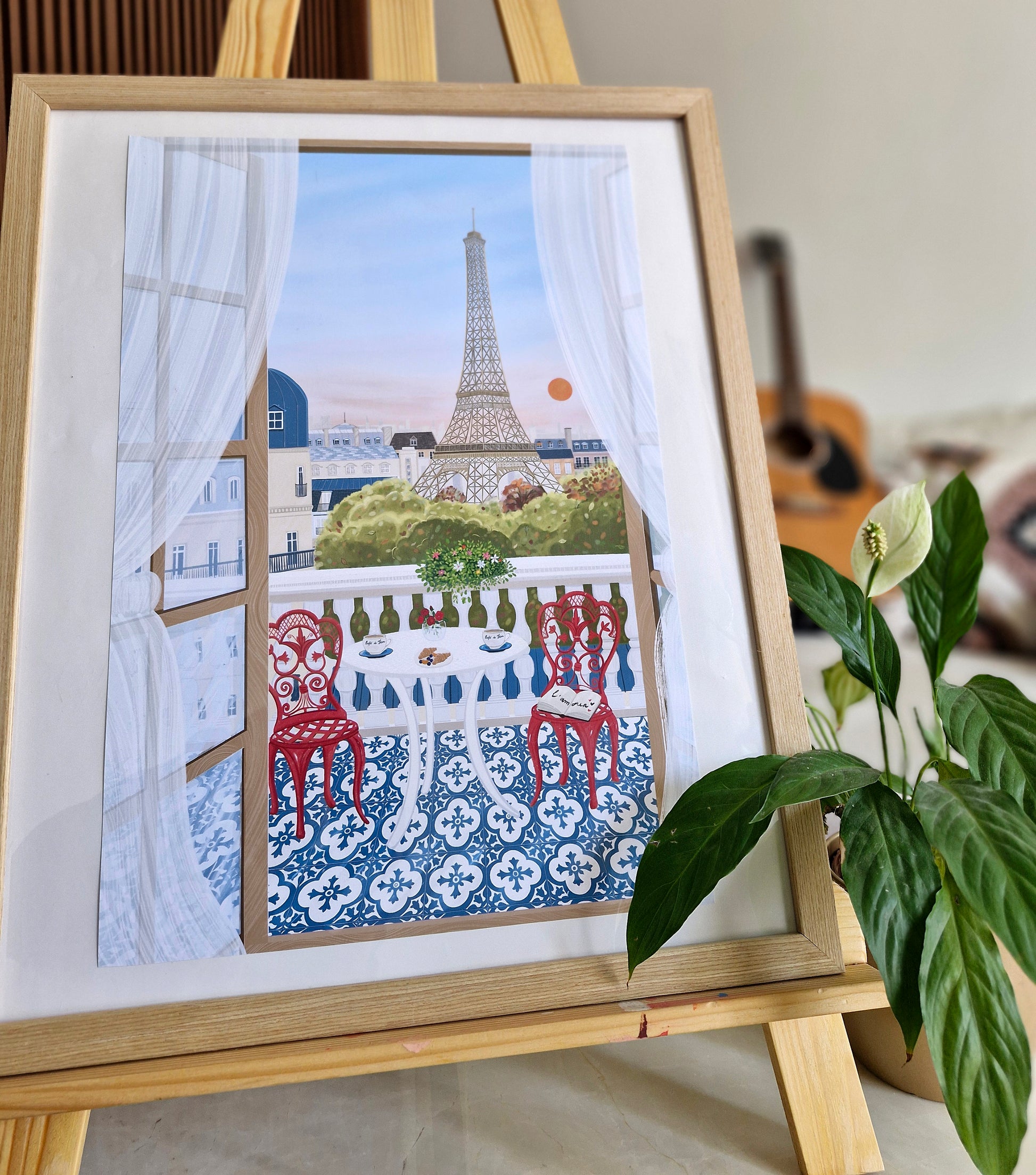 Paris, France, Travel Art Poster. Paris Art Poster Framed in Wooden Frame. Featuring Parisian balcony, rooftops, Eiffel tower and sunset. 